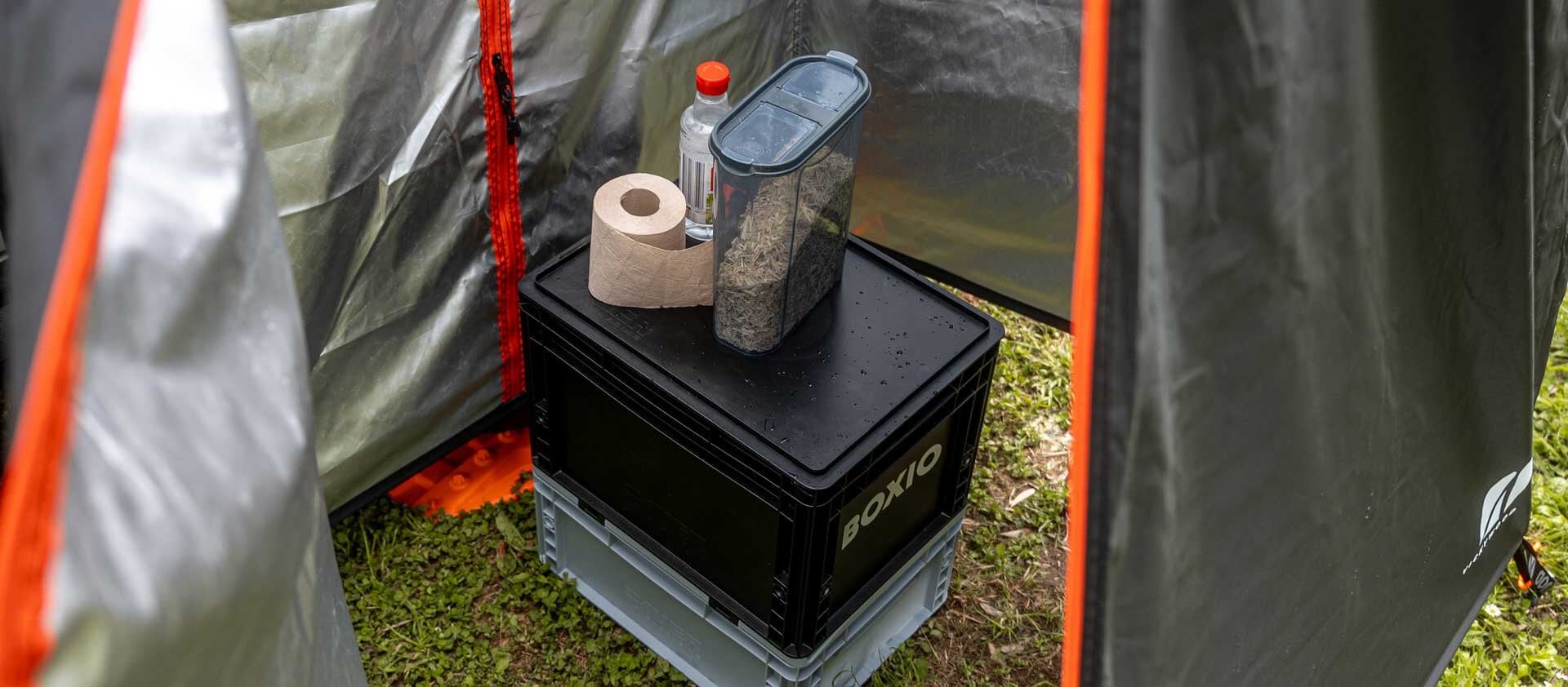 camping toilet in shower/toilet tent