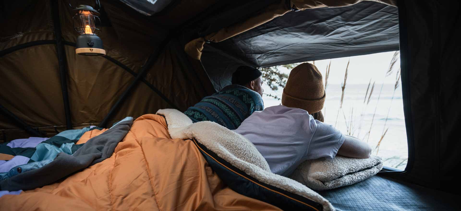 Two persons in their Rooftop Tent