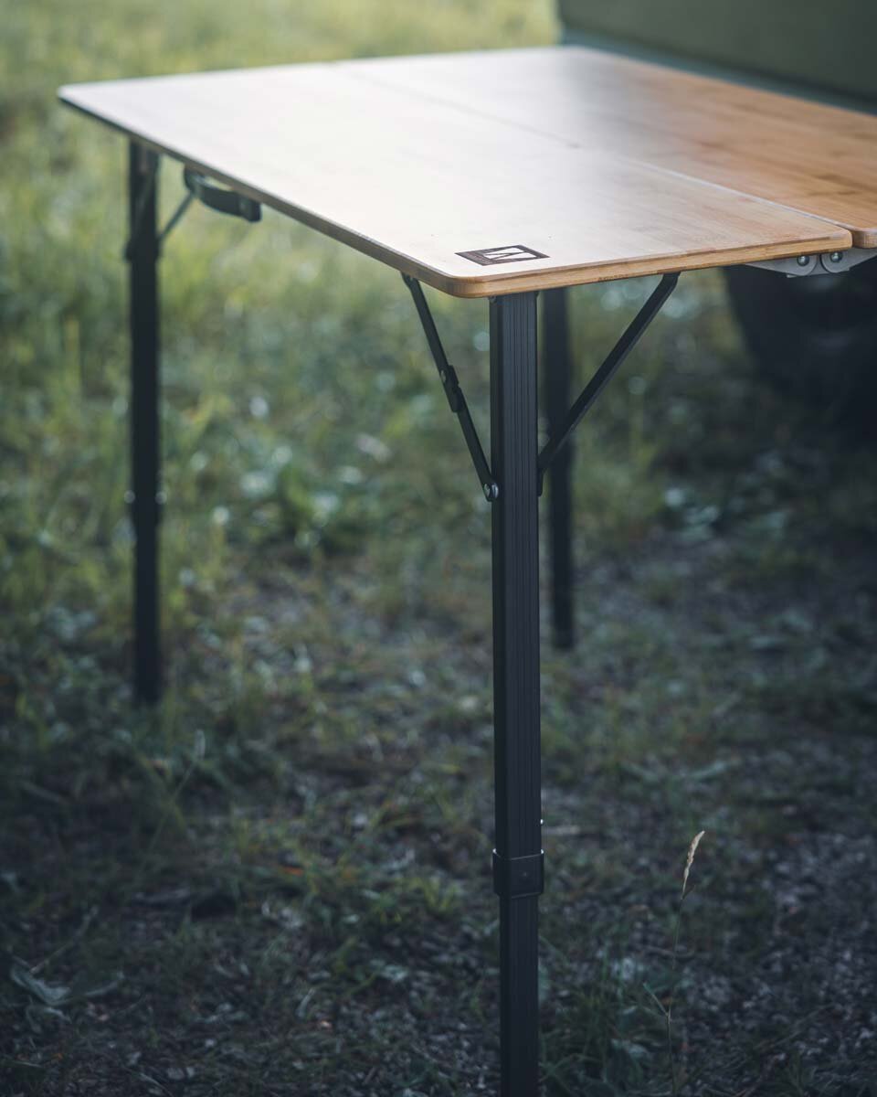 Sturdy, height-adjustable table legs.