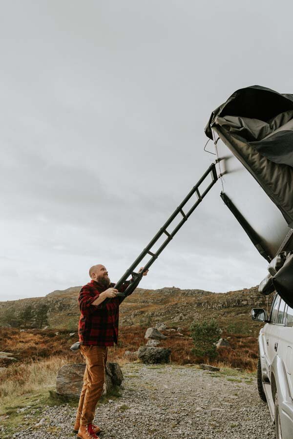 setup folding rooftop tent alone